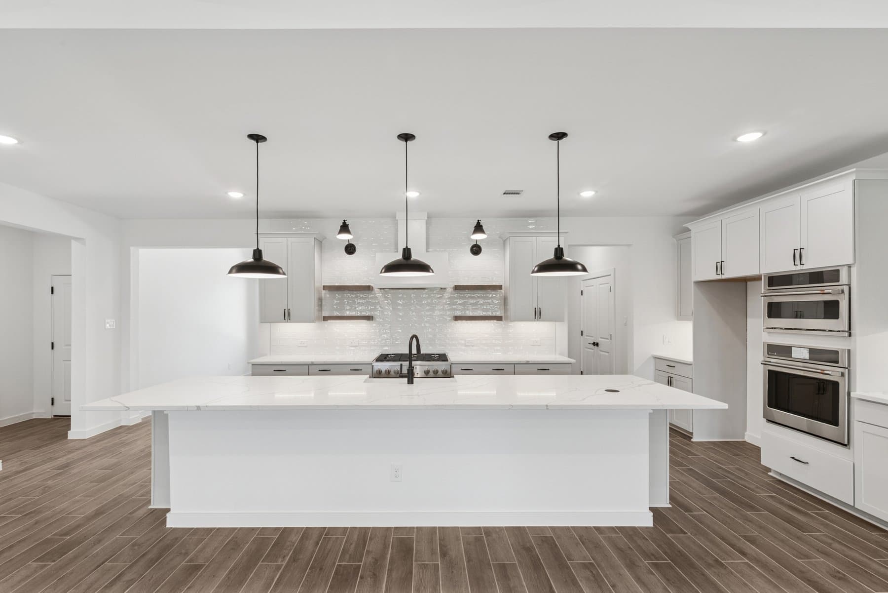 Kitchen with stylish floating shelves