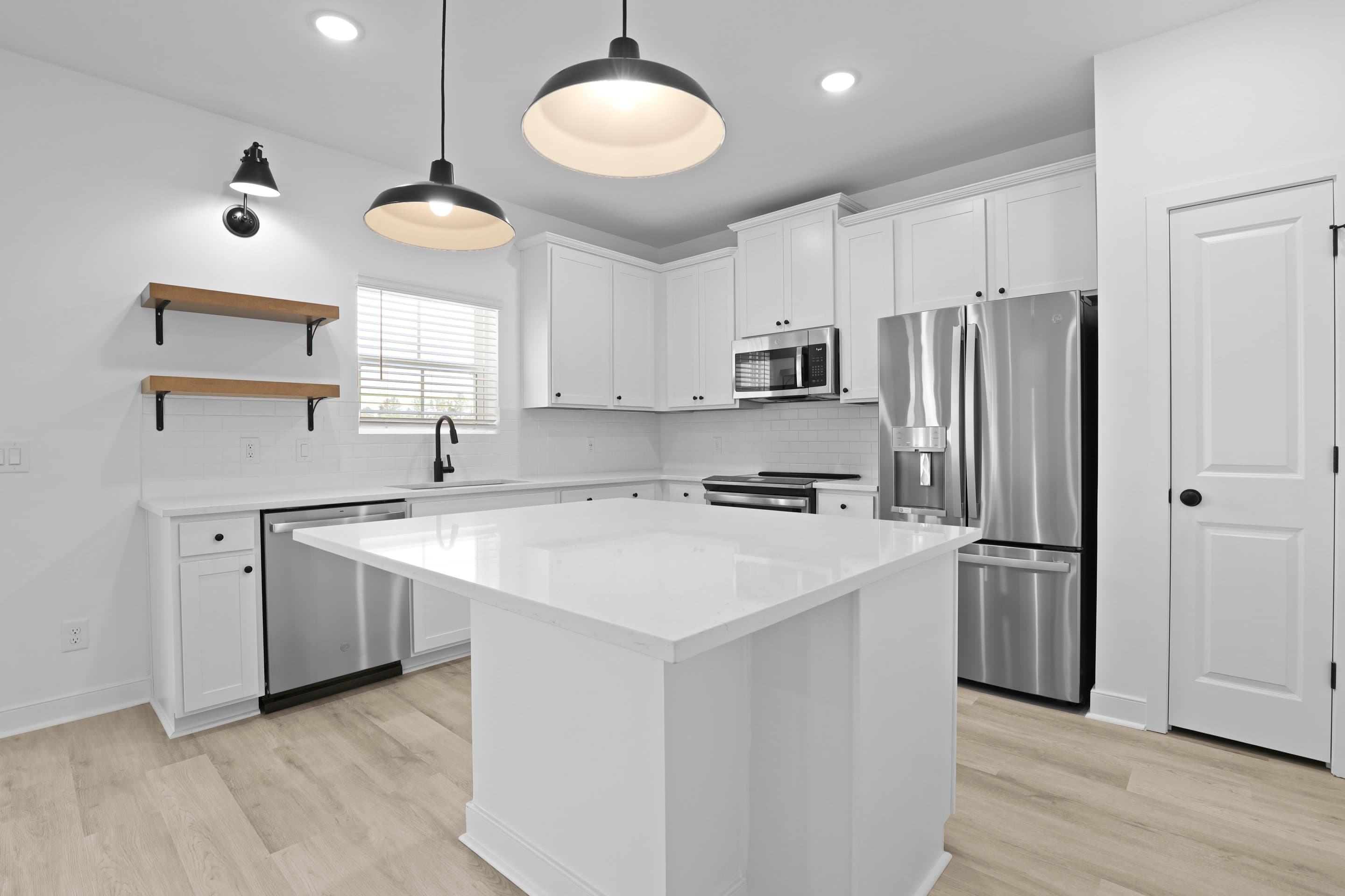 Kitchen featuring vast island