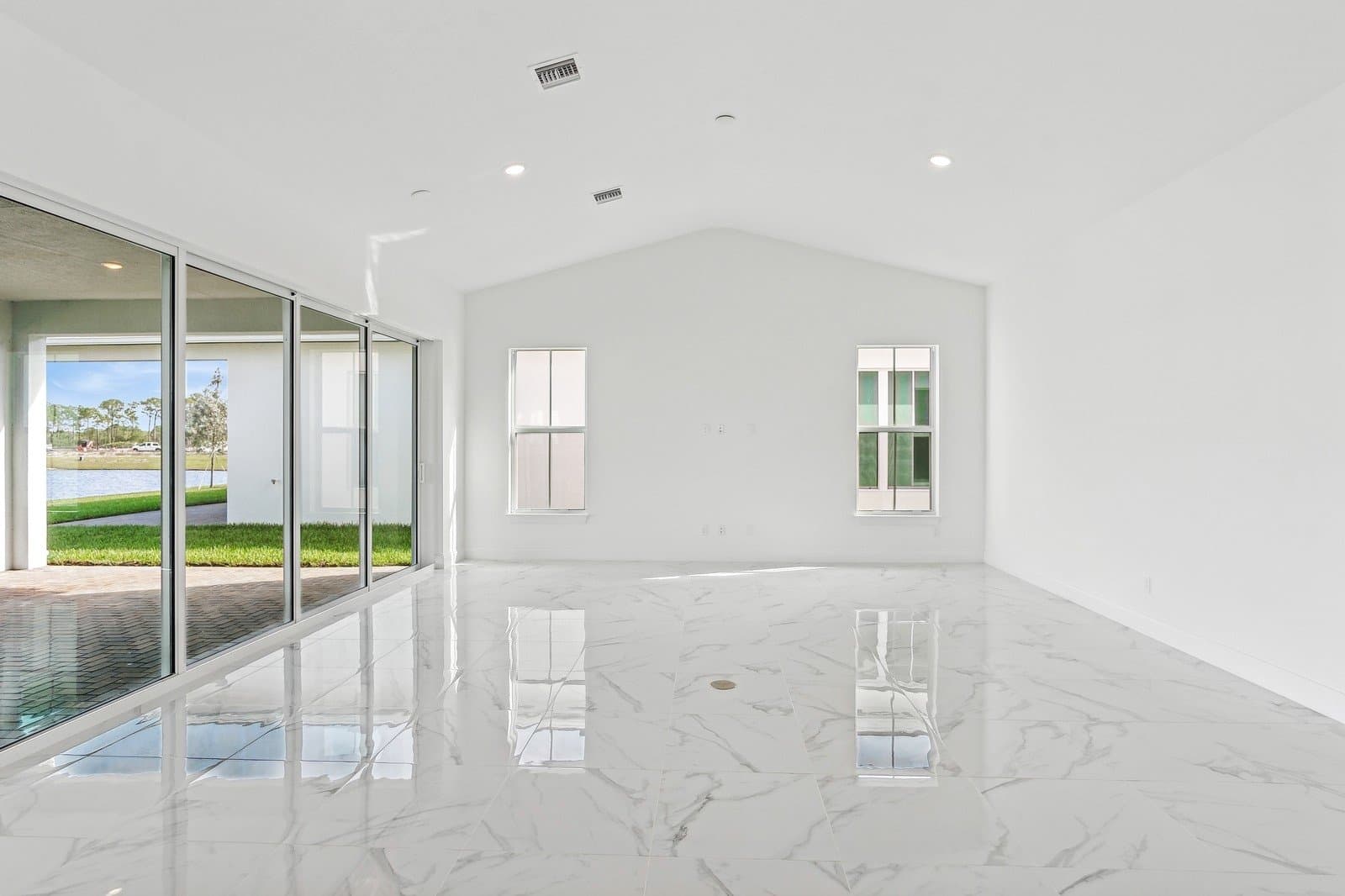 Great Room with soaring vaulted ceiling