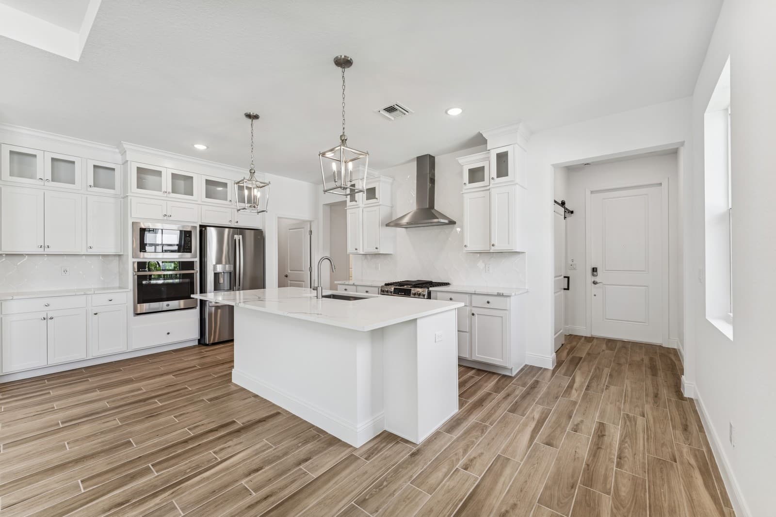 Kitchen featuring vast island