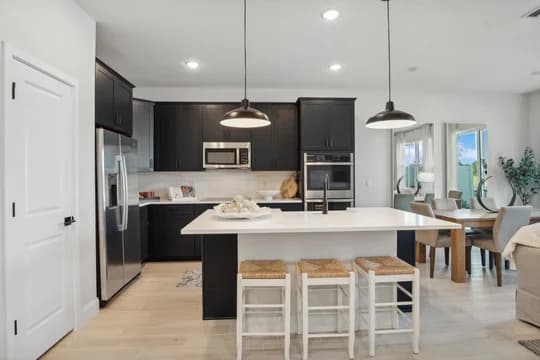 Salerno Reserve Townhomes Arabella II Kitchen and Dining Area Farmhouse Level
