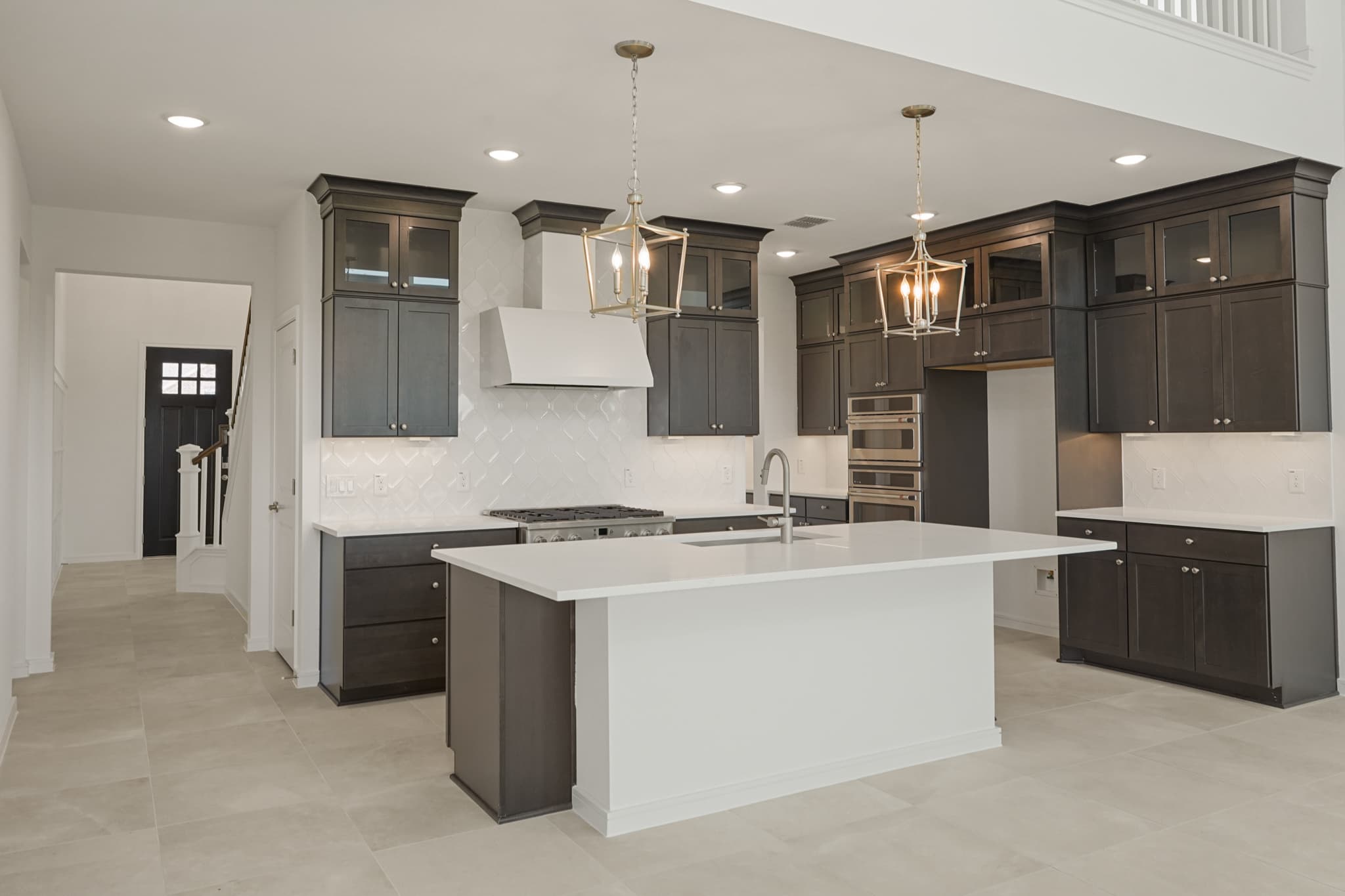 Kitchen featuring vast island