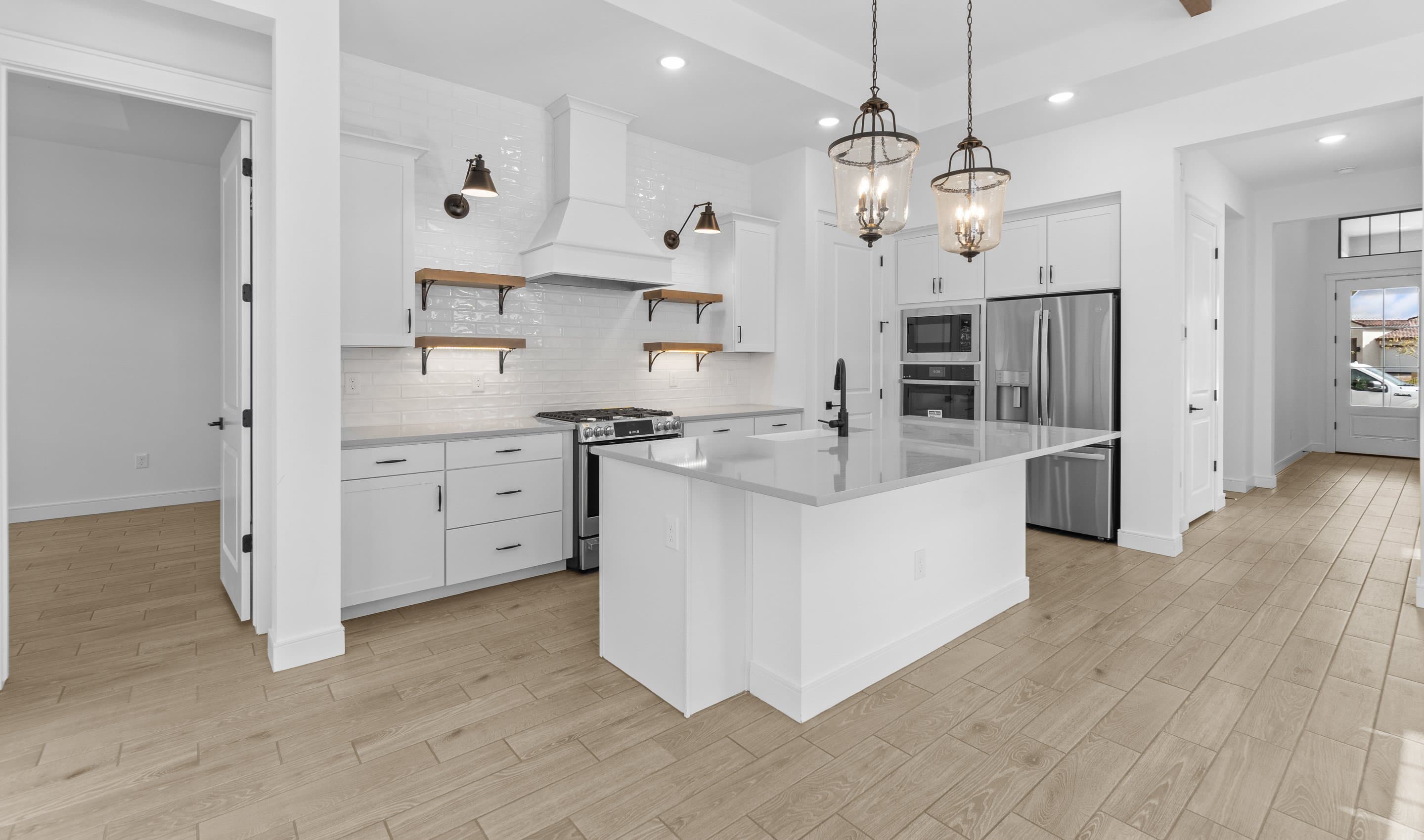 Kitchen with quartz countertop & island