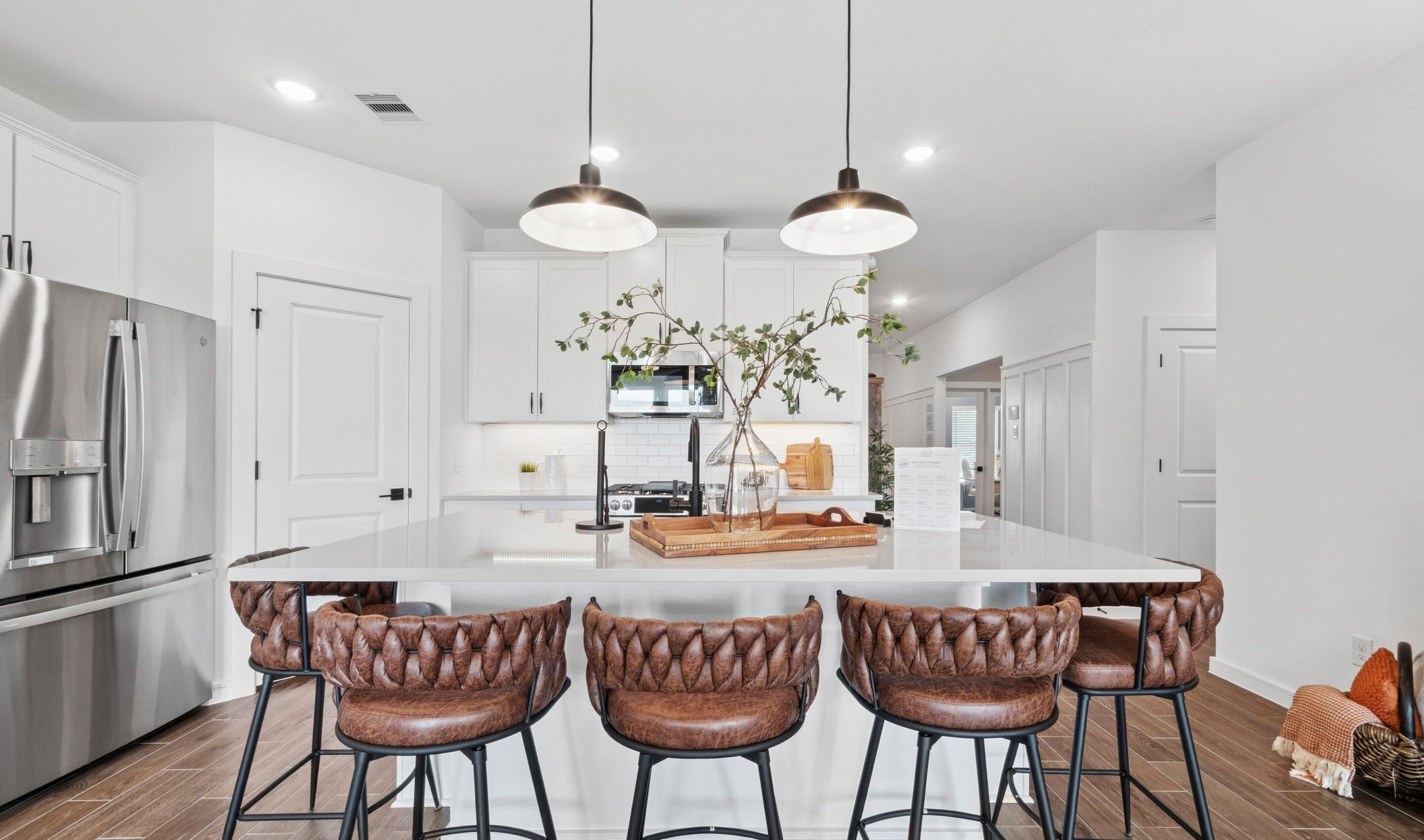Kitchen with matte black pendant lighting