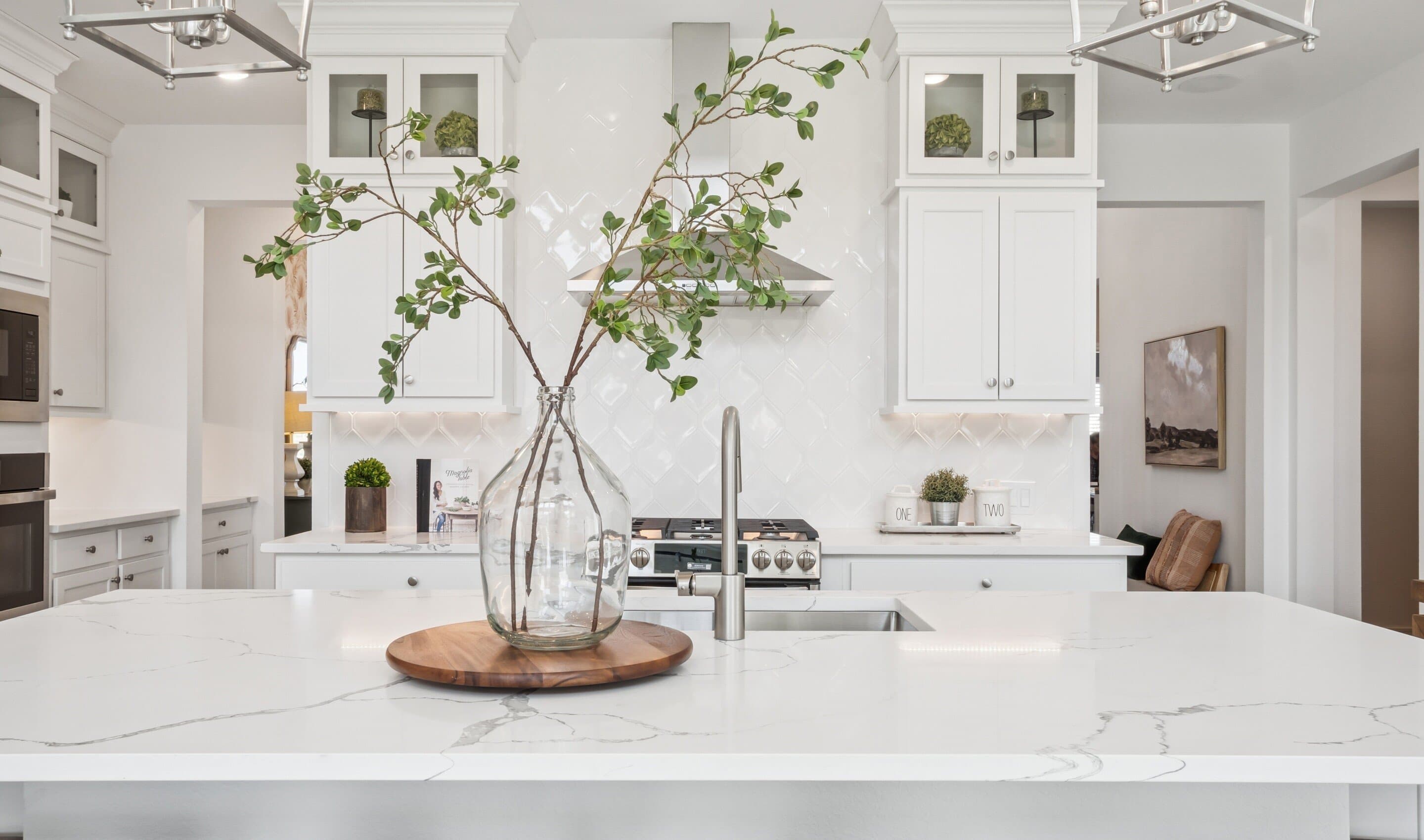 Kitchen with full-height tile backsplash